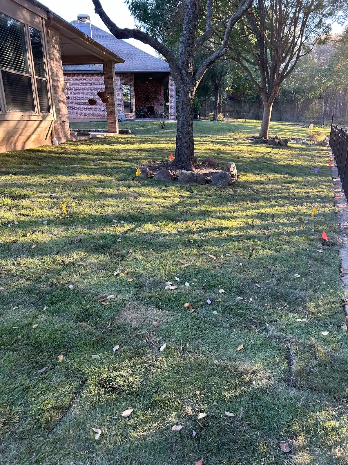 Completed yard drainage system backfilled and graded
